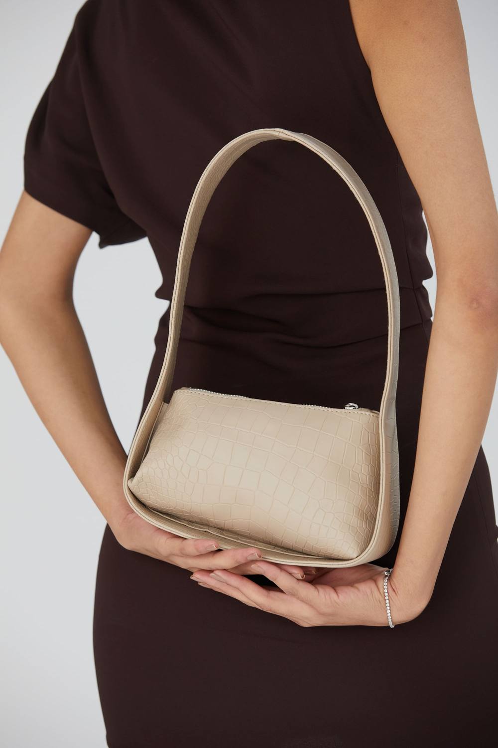 Belissh Women's Asymmetric Croc Baguette Bag in Beige