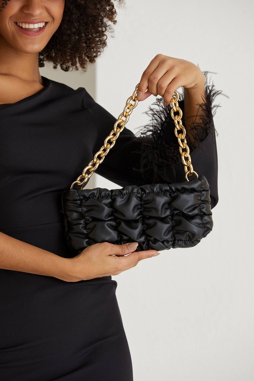 Belissh Women's Puffy Quilted chunky Chain Handbag in Black